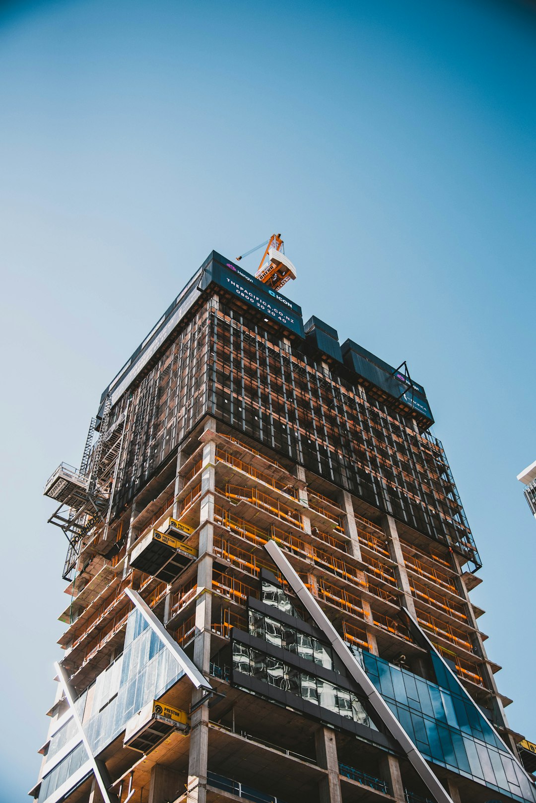 brown-and-gray-building-under-construction-9cnzcy4ysne